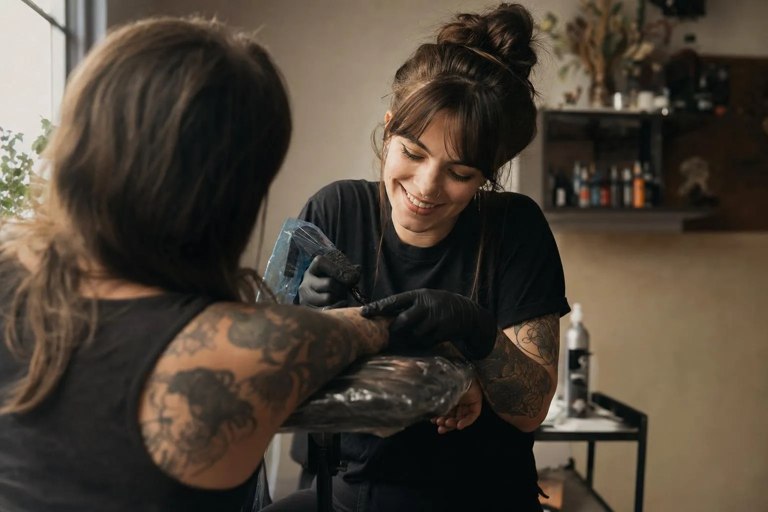 Stencils, machines, and ink caps arranged on a tattoo station